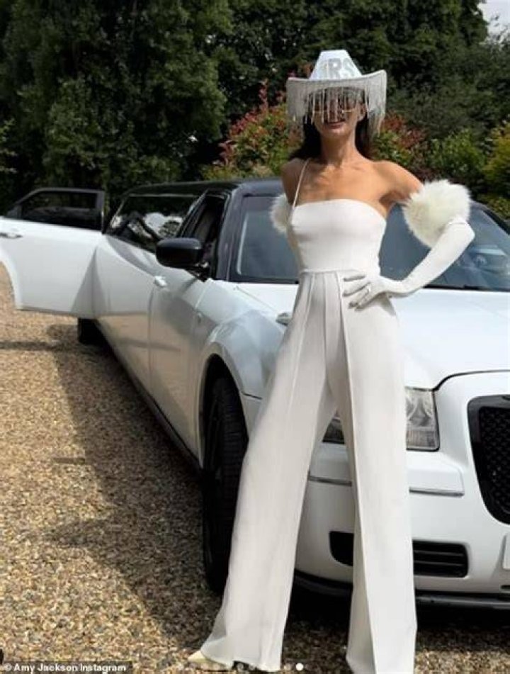 Lavish: Photographs showed huge white marquees being decked out with chic gold and white tables