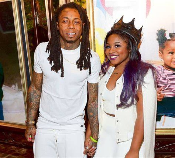 Lil Wayne's daughter Reginae Carter and her baby sister are all smiles in matching denim dresses