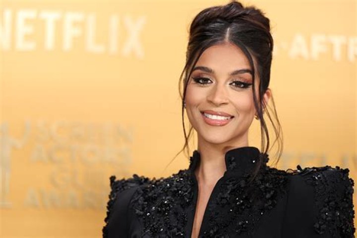 Lilly Singh has a bold style when it comes to wedding guest beauty, from pop of colours to