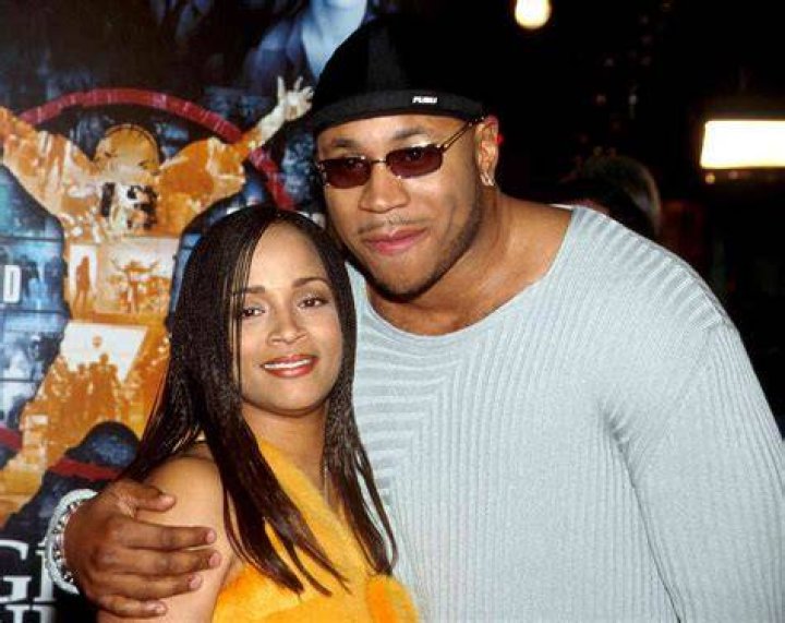 LL Cool J's Wife Simone Rocks Large Hoop Earrings in a New Photo Posing in a Pink Shirt