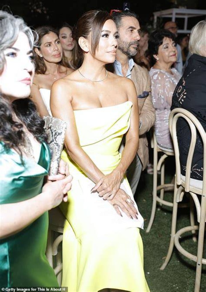 Looking good: Eva styled her brunette locks in a slicked back low ponytail as she cut a glamorous figure