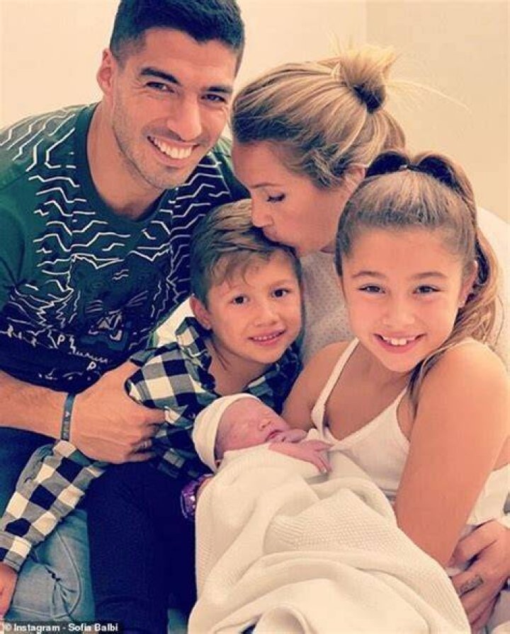 Luis Suarez shows off newborn son after starring in Champions League Daily Mail Online