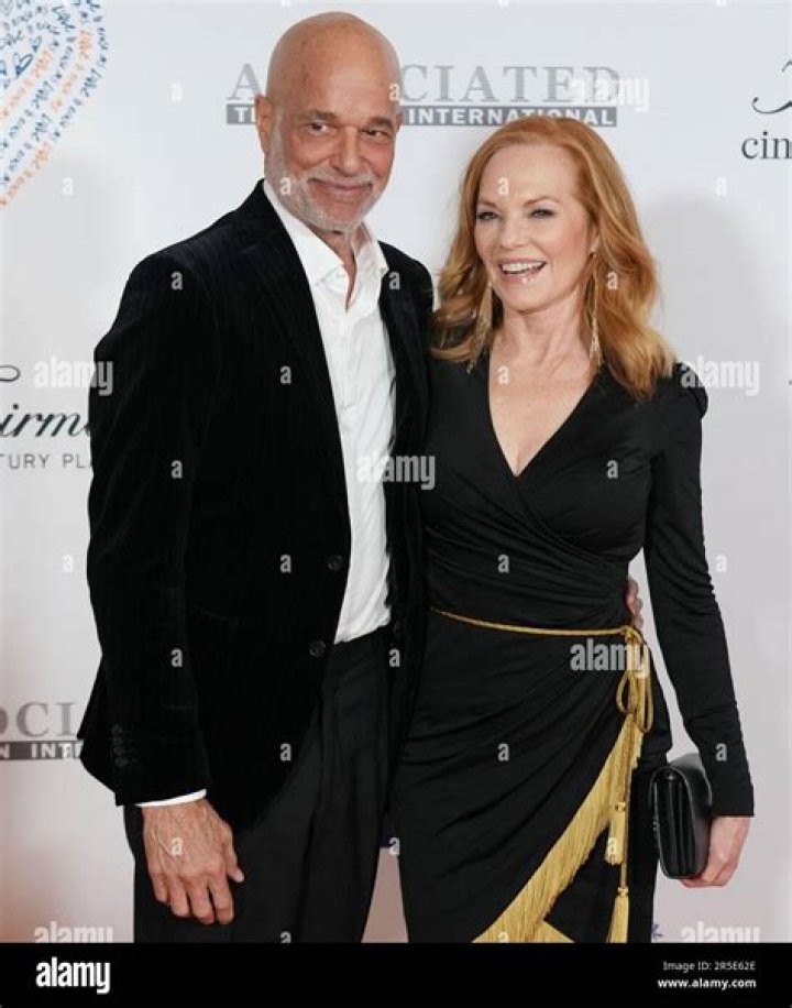 Marg Helgenberger (L) and husband SAG President Alan Rosenberg arrive at the Los Angeles Premiere Of "An Inconvenient Truth" held at the DGA | Getty Images