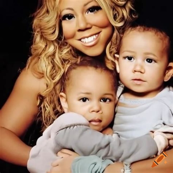 Mariah Carey with her children Moroccan Cannon and Monroe Cannon while she is honored with a star on The Hollywood Walk of Fame, August 5, 2015. | Source: Getty Images