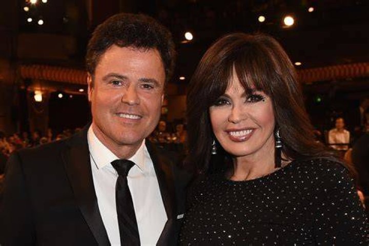 Marie Osmond and her Ex husband Brian Blosil leave a book signing for her new book "Behind the Smile" May 1, 2001. | Photo: Getty Images