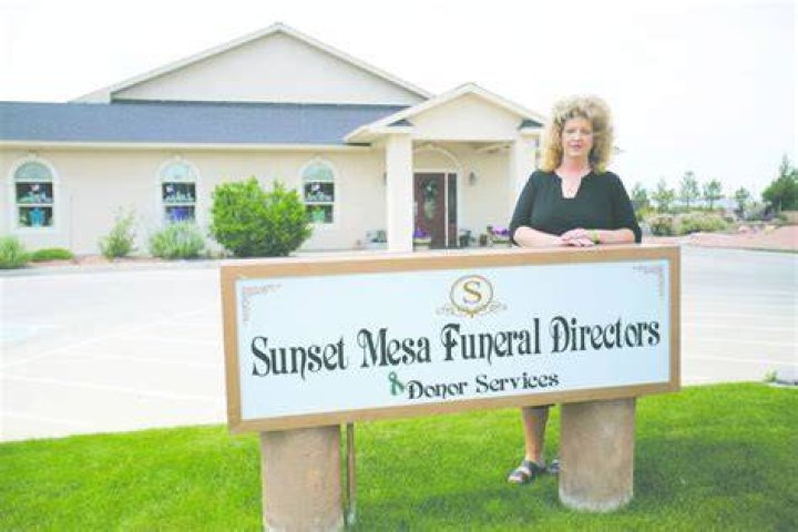 Megan Hess and her funeral home appear in KMGH-TV screengrab.