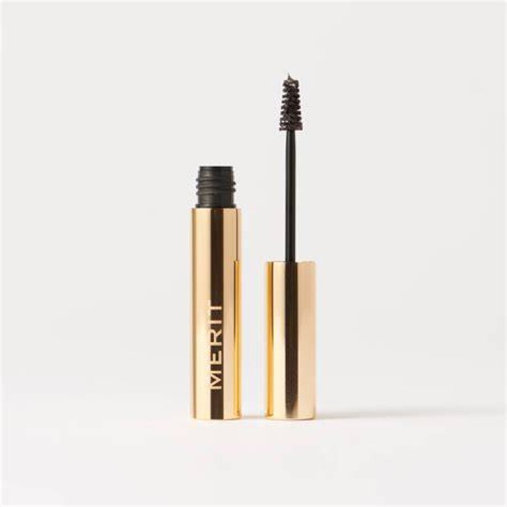 Merit beauty brow 1980 product on the left and author wearing it on the right
