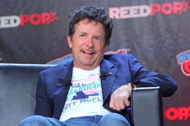 Michael J. Fox speaks during a "Back To The Future Reunion" panel at New York Comic Con on October 08, 2022 in New York City | Source: Getty Images