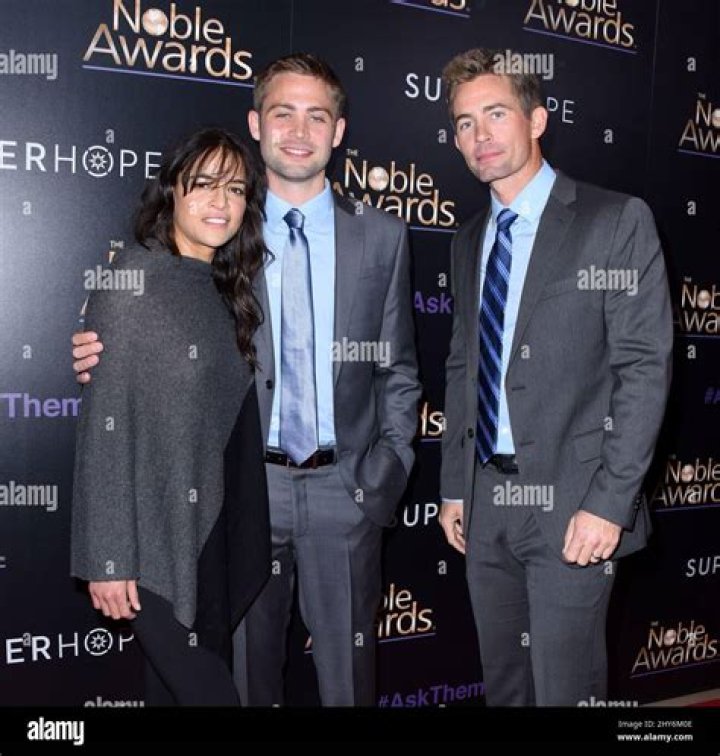 Michelle Rodriguez, Cody Walker, Caleb Walker and Tyrese Gibson on stage during the 3rd Annual Noble Awards on February 27, 2015 in Beverly Hills. | Source: Getty Images