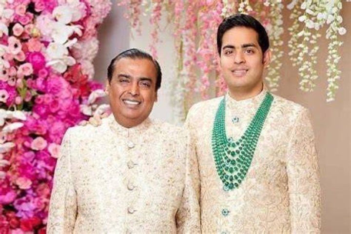 Mukesh Ambani and Akash at the 42nd AGM of Reliance Ind. Ltd in Mumbai, India. | Photo: Getty Images