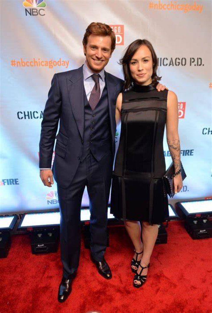Nick Gehlfuss and Lilian Matsuda pose at a premiere party for NBC's 'Chicago Fire', 'Chicago P.D.' and 'Chicago Med' at STK Chicago on November 9, 2015, in Chicago, Illinois | Source: Getty Images