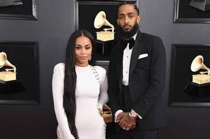 Nipsey Hussle and Lauren London attend a basketball game at Staples Center on November 14, 2018 in Los Angeles, California. | Source: Getty Images