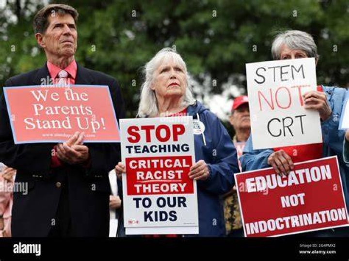 Opponents of the academic doctrine known as Critical Race Theory protest outside of the Loudoun County School Board headquarters, in Ashburn, Virginia, in June 2021