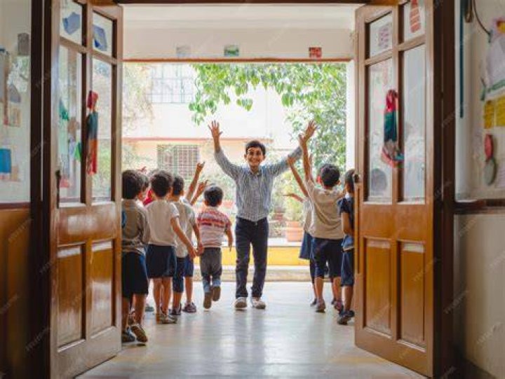 Parents enter a school in Kiryat Ono, Israel