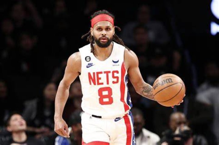 Patty Mills drills one of his nine three-pointers.