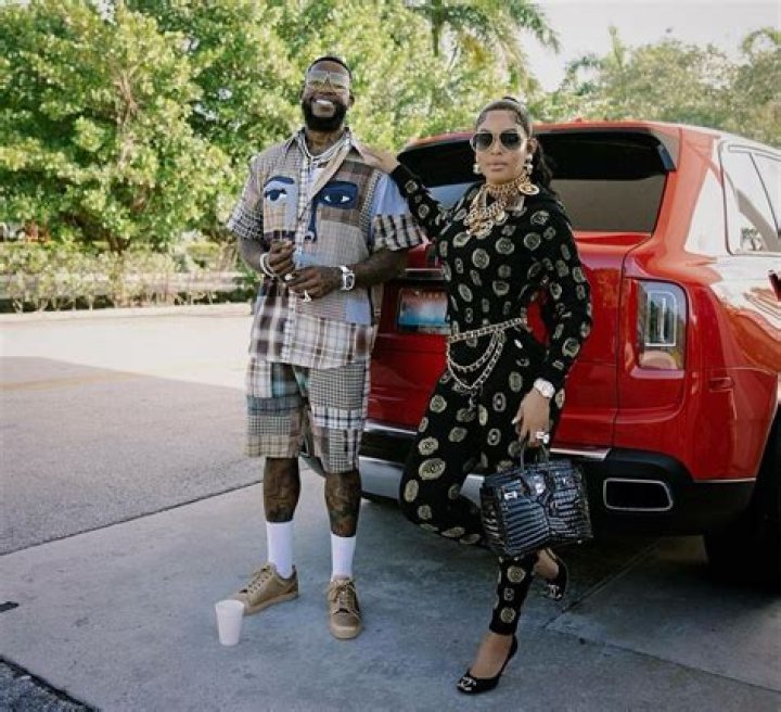Power couple Gucci Mane and Keyshia Ka'oir watching the game between the Boston Celtics and the Brooklyn Nets on November 27, 2019 | Photo: Getty Images