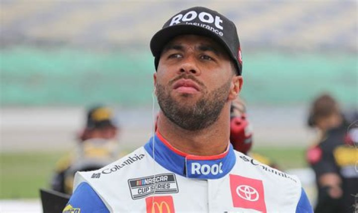Race car driver Bubba Wallace before qualifying for the NASCAR Cup Series Auto Club 400 at Auto Club Speedway in February 2020. | Photo: Getty Images