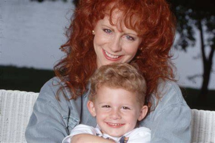 Reba McEntire hugs her young son Shelby Steven McEntire Blackstock, circa 1994 | Source:&nbsp;Getty Images