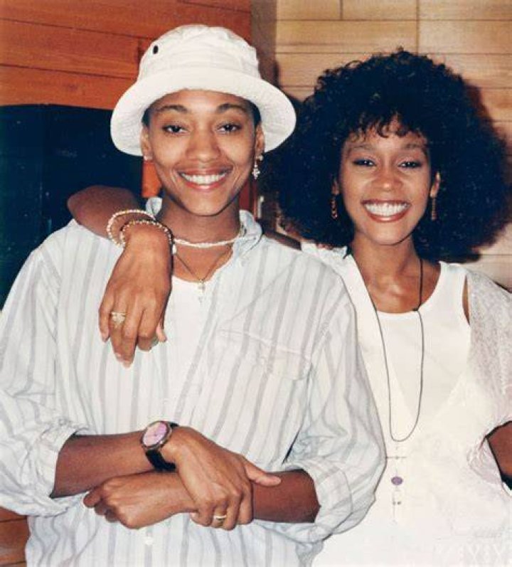 Robyn Crawford and American singer Whitney Houston at an event | Photo: Getty Images