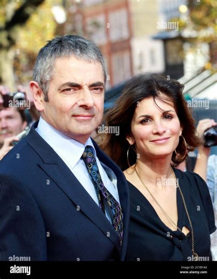 Rowan Atkinson and his ex-wife, Sunetra Sastry, at Sir David Frost's Summer Party in London | Source: Getty Images