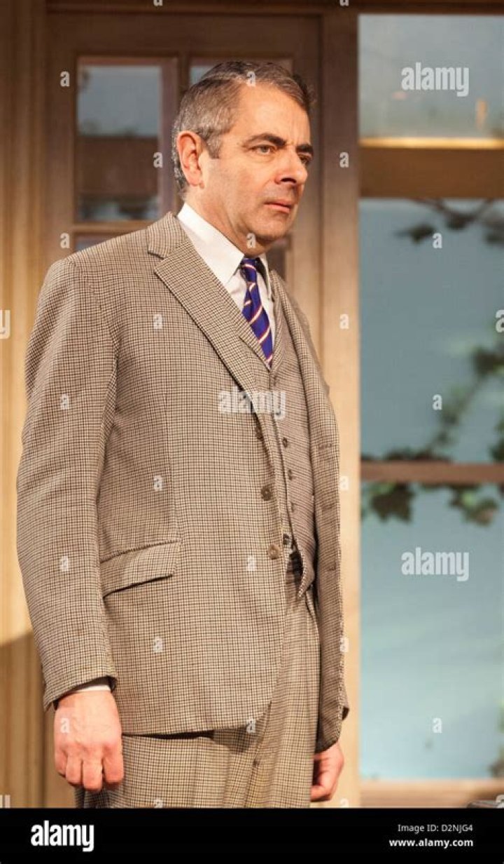 Rowan Atkinson as St John Quartermain, Malcolm Sinclair as Eddie Loomis with Louise Ford as Anita Manchip in Simon Gray's Quartermaine's Terms Wyndham's Theatre in London | Source: Getty Images