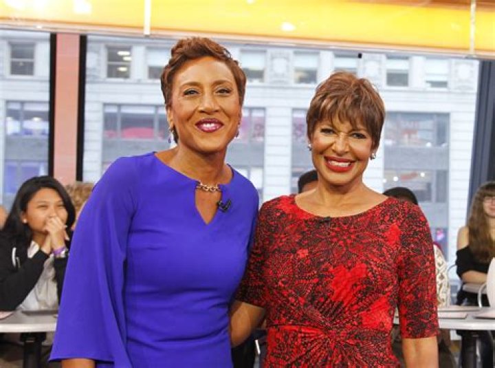 Sally-Ann Roberts and Robin Roberts attend the CoachArt Gala of Champions at The Beverly Hilton Hotel on October 17, 2013 | Photo: Shutterstock