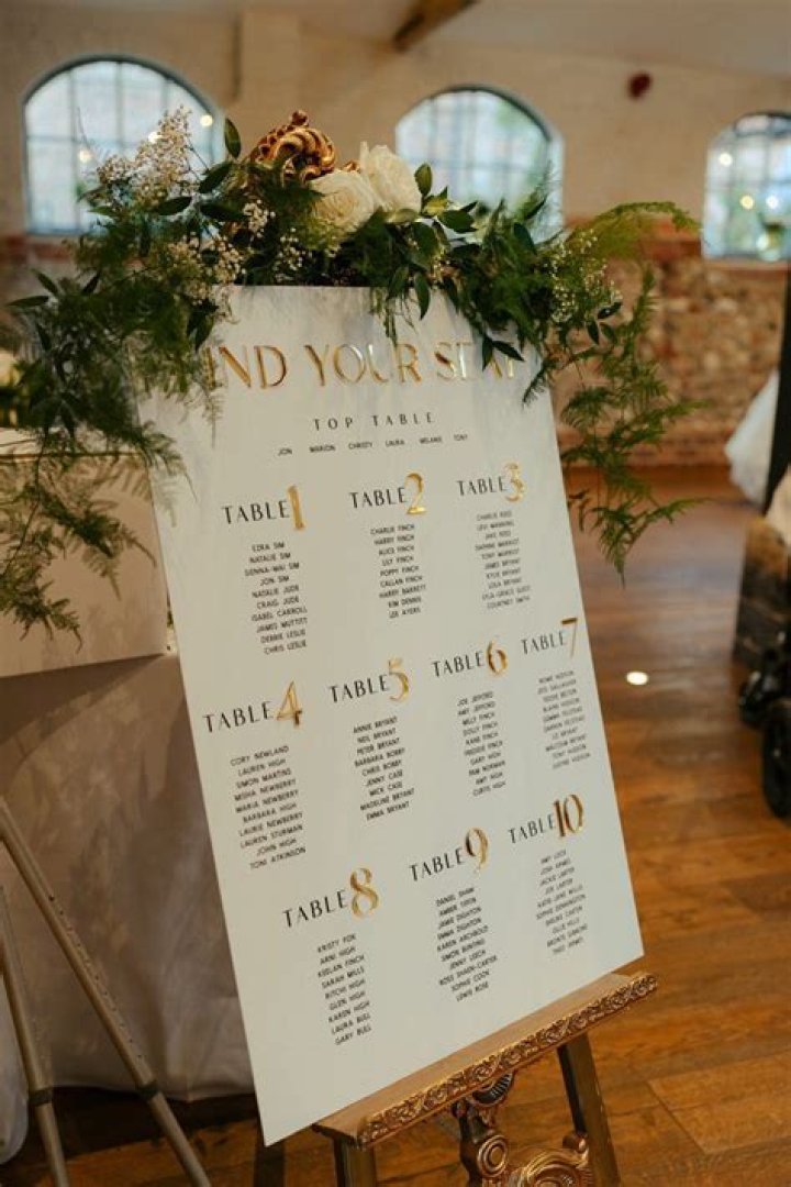 Seating: The gold and white tables were set up for people to sit at and enjoy drinks following the ceremony