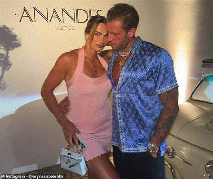 She has often posed topless or with her arms covering her chest