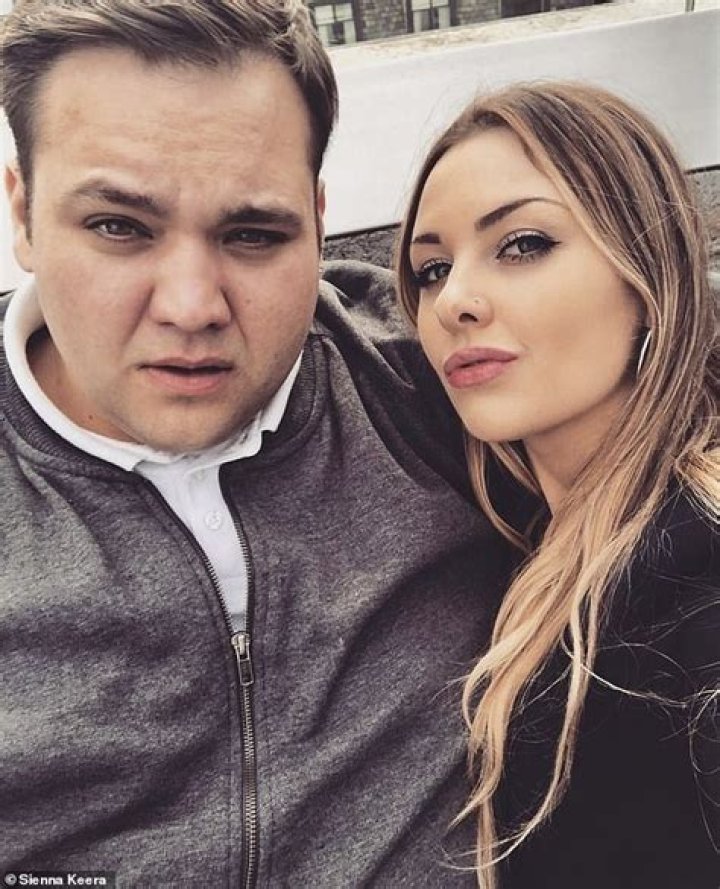 Sienna also showcases her slender physique in figure-hugging ensembles - while George (pictured together) is equally unashamed to show off his body, often appearing in the clips topless