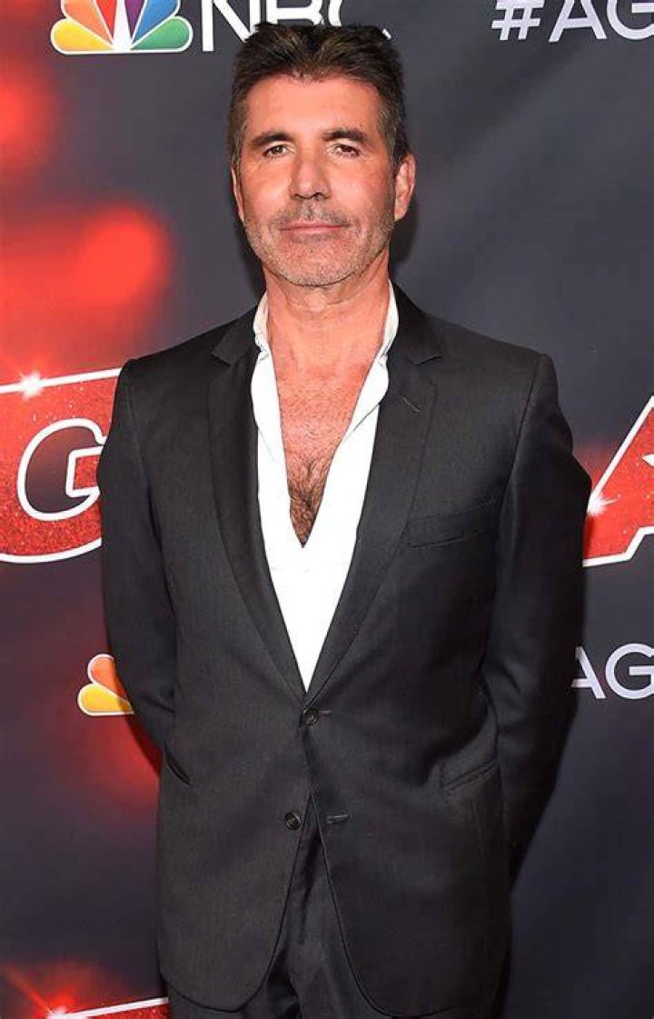 Simon Cowell Suffers Broken Arm After 2nd Bike Accident Us Weekly