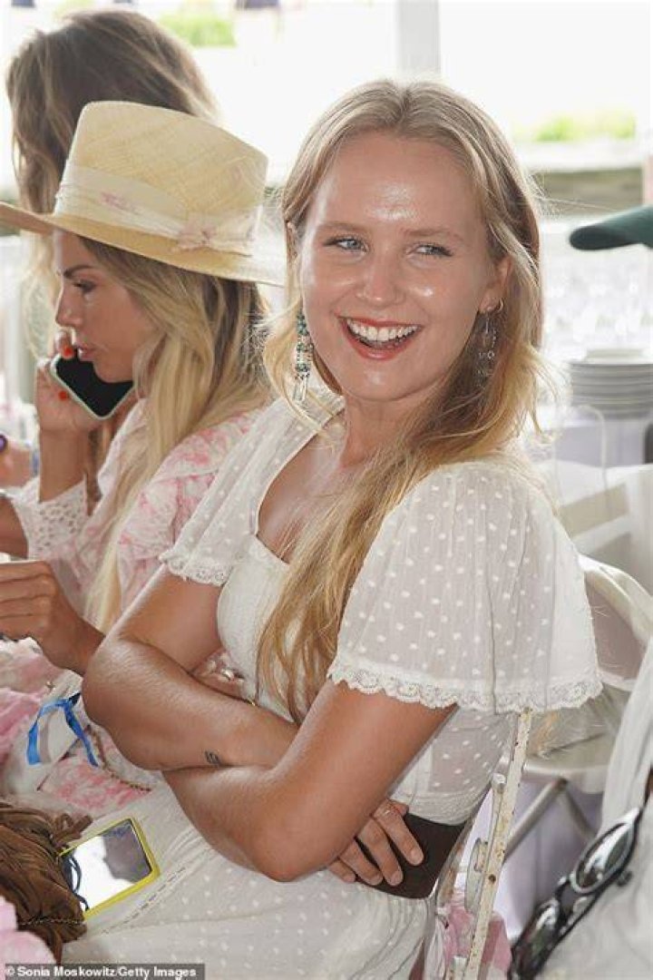 Sitting pretty: Cook beamed as she attended the 45th annual event for the world-class equestrian competition for over $800K in prize money