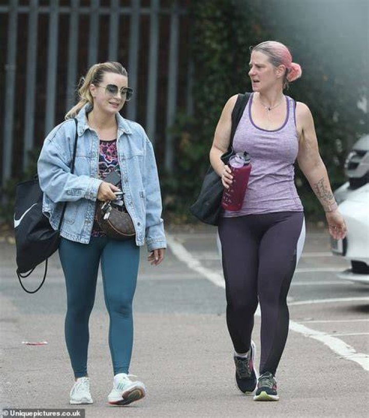 Sporty: She donned a pair of black Adidas leggings with a cut out design - paired with a matching sleeveless sports top