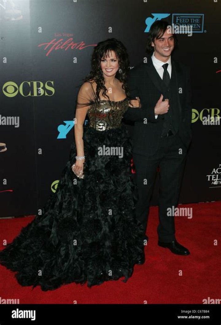 Stephen Blosil and Marie Osmond performing during the Marie Osmond's Magic of Christmas show on December 1, 2007, in New Jersey | Source: Getty Images