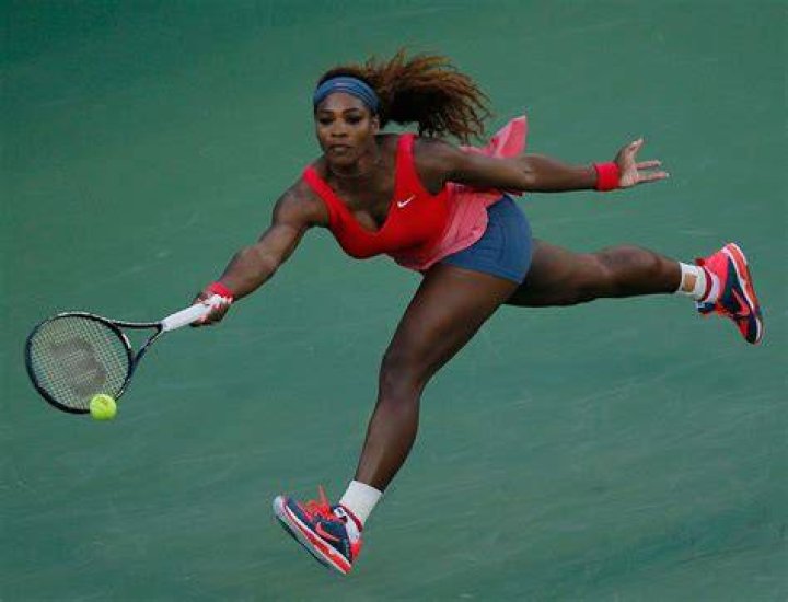Tennis: Serena Williams looked sensational in a bright pink figure-hugging gown with a keyhole cut out, while she styled her ash blonde tresses in a blunt bob