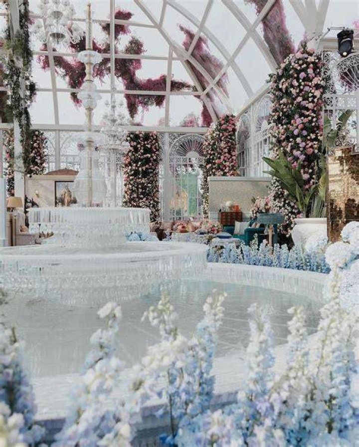 The dazzling pre-wedding table was adorned with pink roses from Rose Box NYC