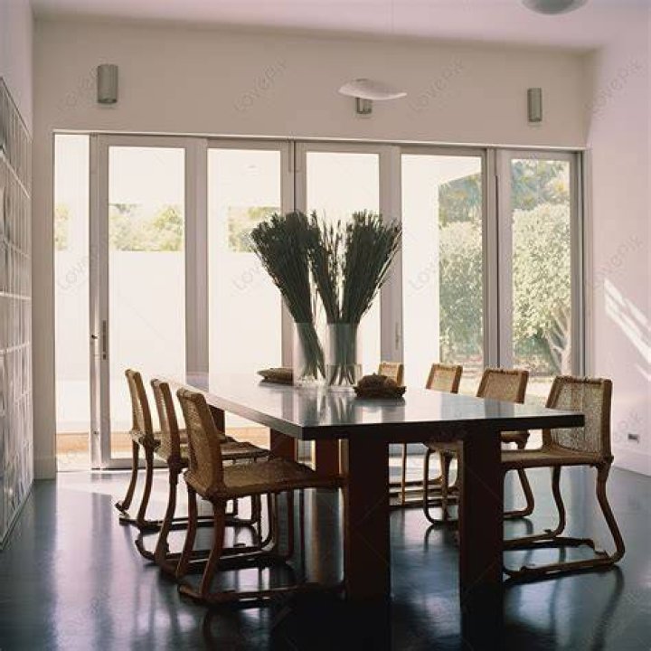 The dining room has a built-in bar with a copper countertop.