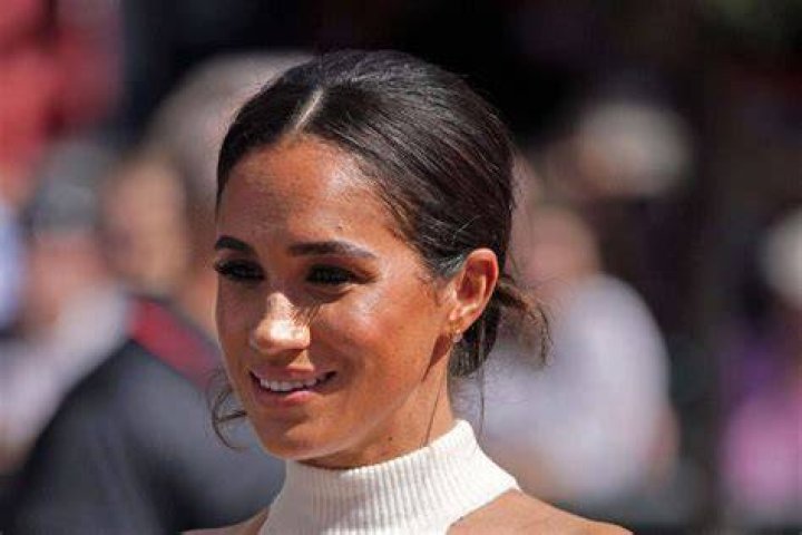 The Duchess of Sussex said it was 'very nice to be back' as she made her first public appearance in the UK since she and her husband Prince Harry announced they were stepping down as senior working royals