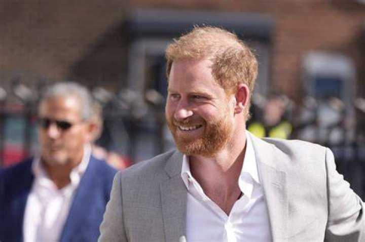 The Duke of Sussex cheers on competitors during the powerlifting event at the Invictus Games, in the Netherlands
