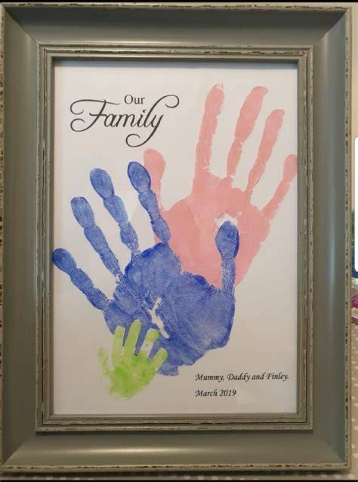 The Hand family are seen in an undated photo, with their son Roman