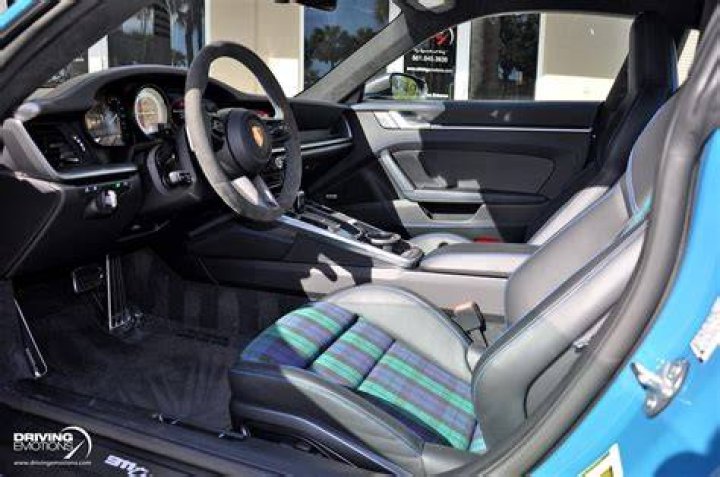 The interior of a rare 1937 Bugatti Type 57S Atalante sports car is seen at the Retromobile auto show in Paris, France, on Friday, Feb. 6, 2009. The automobile, found in a U.K. garage, is to be auctioned by Bonhams on Saturday. | Source: Antoine Antoniol/Bloomberg via Getty Images)