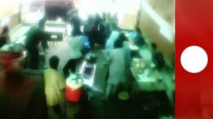 The shocking footage, taken from a gas station overlooking the scene, starts as the Mercedes coupe races past the pumps at blistering pace