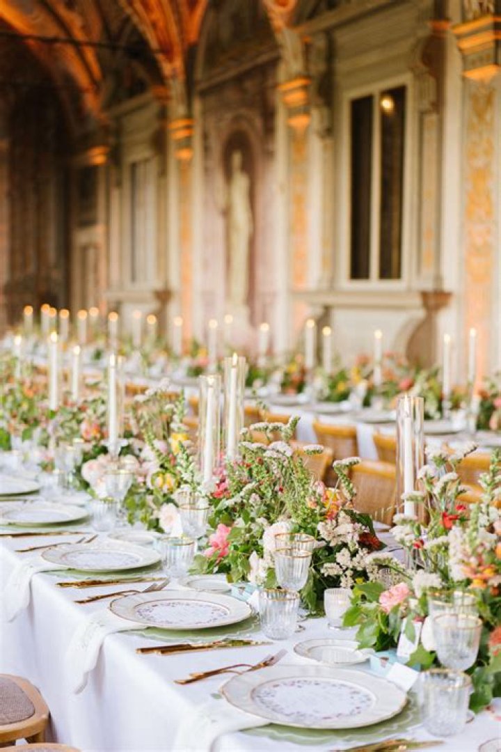 The tables were adorned gorgeous candles, a white runner, menus adorned with a leaf holder and topped off with a thank you note from the loved-up couple