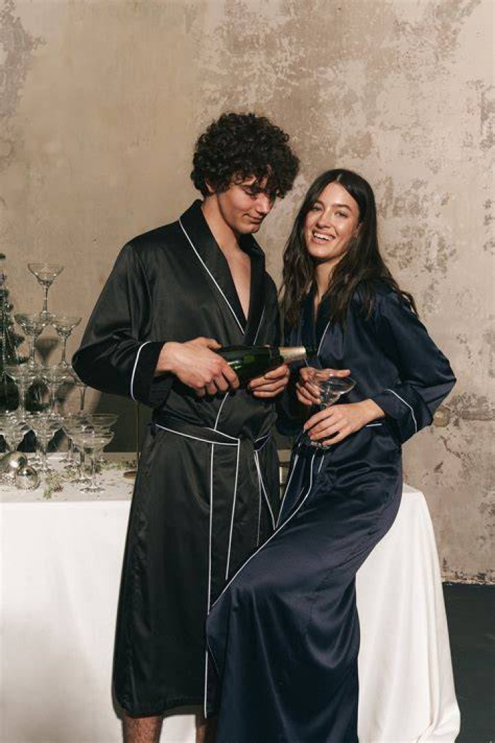 They donned matching dressing robes in one shot