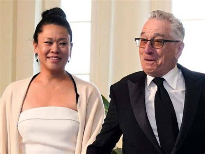 Tiffany Chen and Robert De Niro at the Cannes Film Festival Air Mail /Warner Brothers Discovery Party at Hotel du Cap-Eden-Roc on May 23, 2023 in Cap d'Antibes, France. | Source: Getty Images