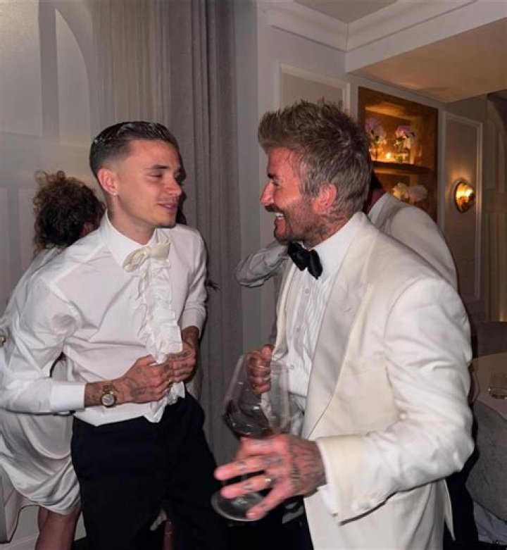 Time to dance!: Romeo Beckham, 19, is pictured with girlfriend Mia Regan as they head to the dance tent