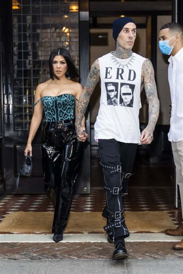 Travis Barker, Kim Kardashian, and unidentified guests attend the LA Stars kick off event hosted by Baron Davis and Paul Pierce sponsored by FENDI at the Beverly Wilshire on August 3, 2007 in Beverly Hills, California | Source: Getty Images