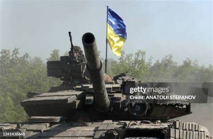 Ukrainian troop ride a tank on a road of the eastern Ukrainian region of Donbas on June 21, 2022, as Ukraine says Russian shelling has caused "catastrophic destruction" in the eastern industrial city of Lysychansk, which lies just across a river from Severodonetsk where Russian and Ukrainian troops have been locked in battle for weeks