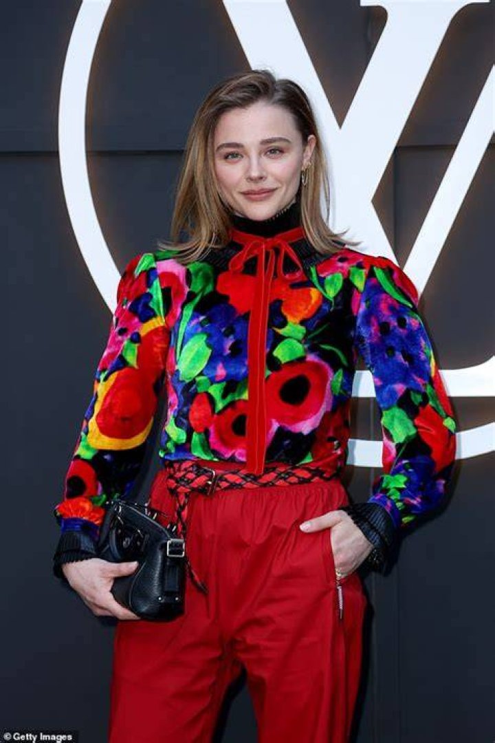 Unique: She kept her essentials in a statement pink fringed bag