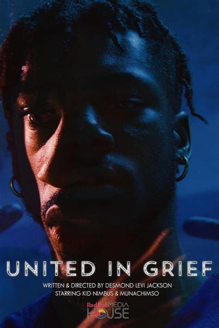 United in grief: People of all ages were seen crying and embracing each other as the chaplain led the assembly in prayer