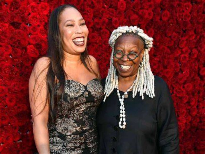 Whoopi Goldberg and her grand daugther Jerzey attend Jeremy Scott's fashion show during MADE Fashion Week Spring 2015 at Milk Studios | Photo: Getty Images